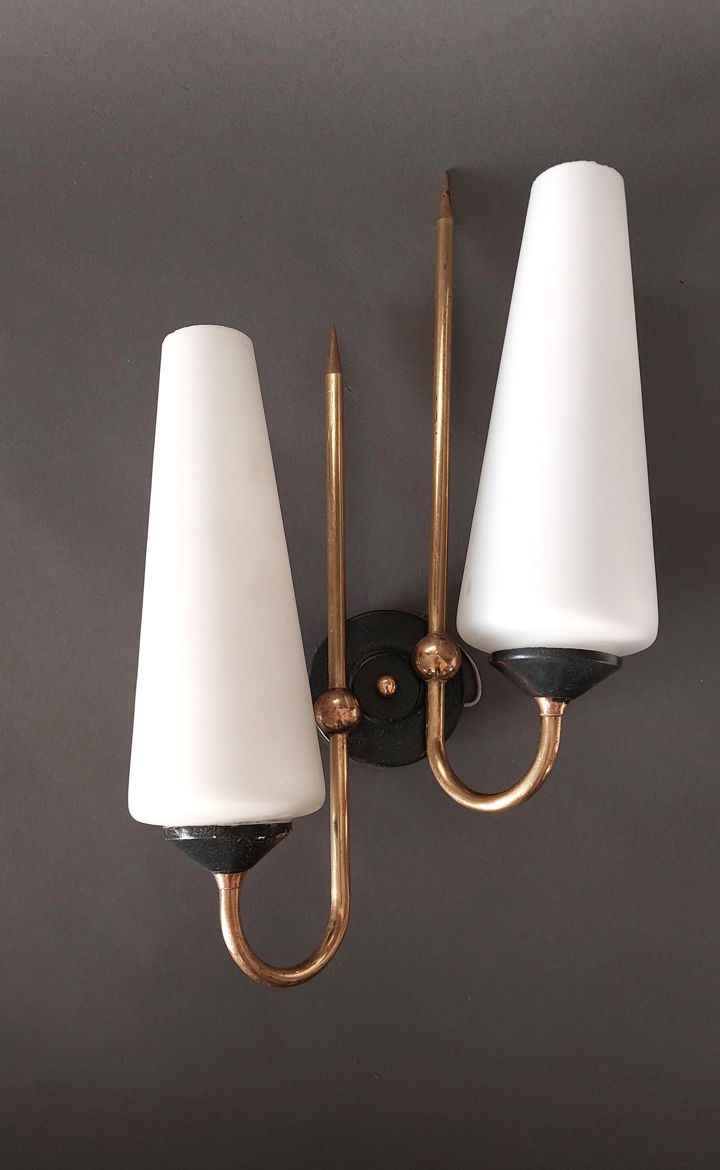 Pair of sconces in black metal and gilded brass 1960 Vintage.