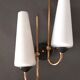Pair of sconces in black metal and gilded brass 1960 Vintage.