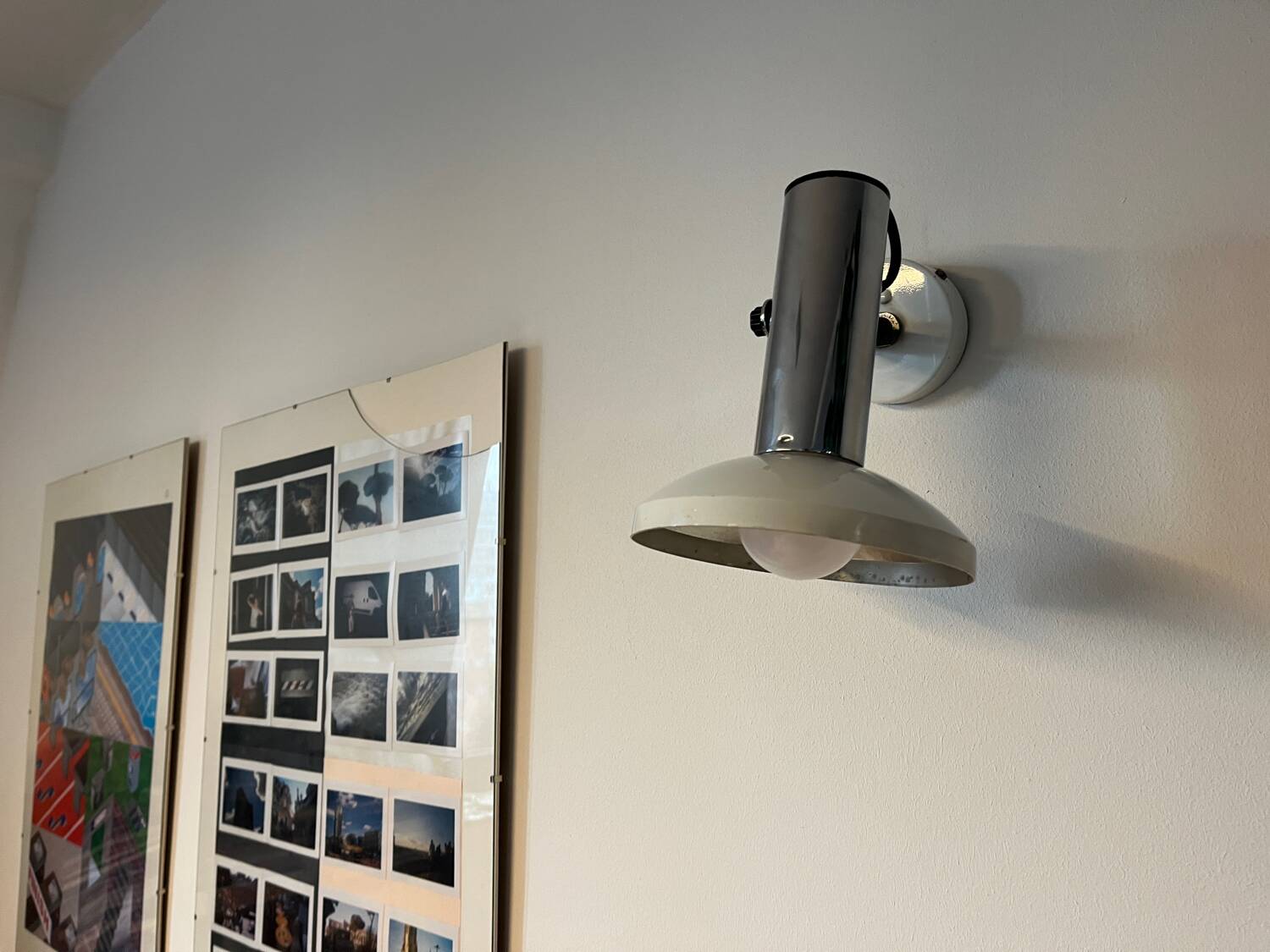 Wall light in metal and chrome-plated plastic