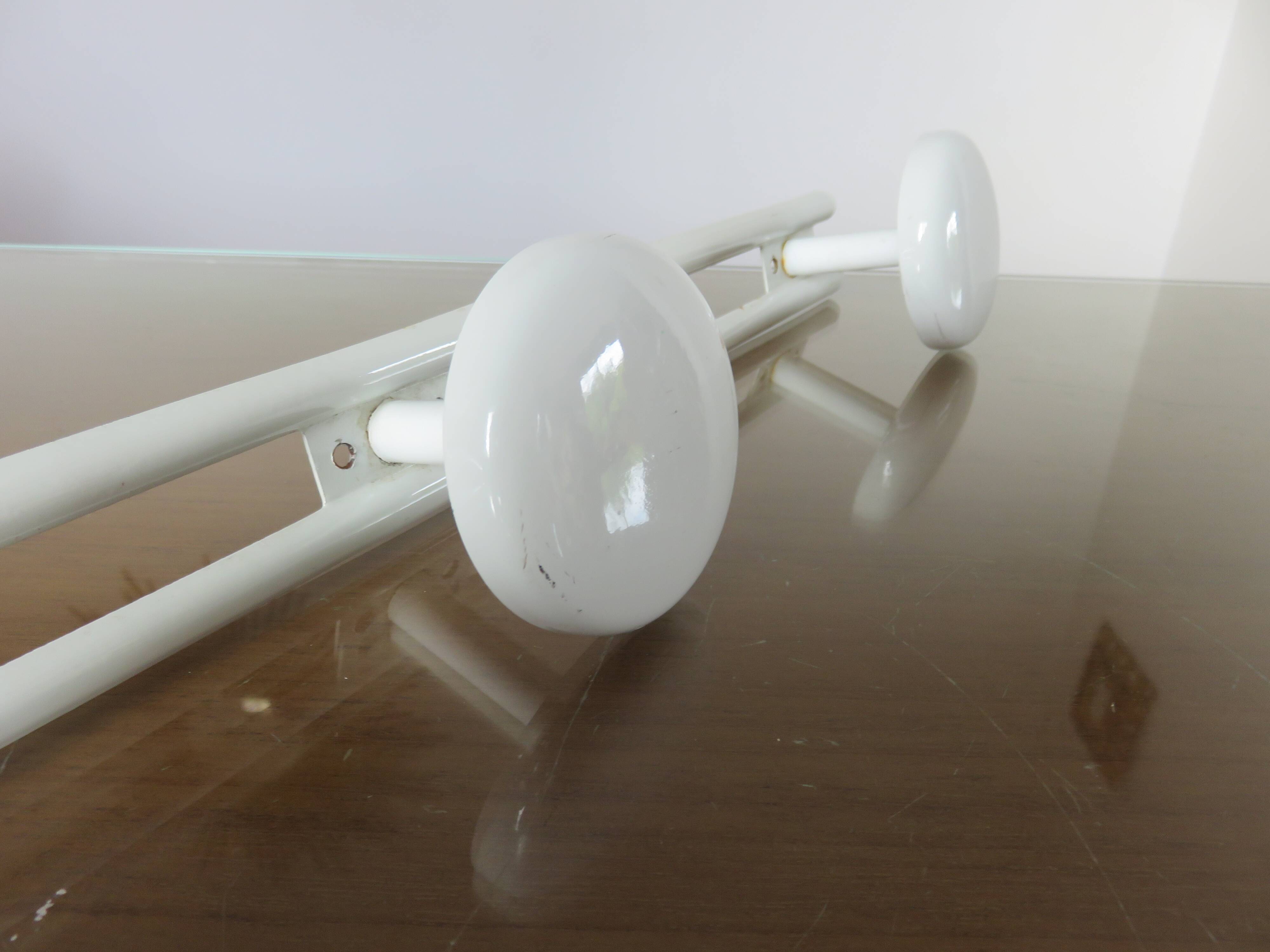 White lacquered metal wall coat rack with 3 hooks, 1970.