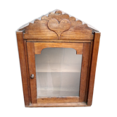 Showcase of popular art in solid wood, carved heart.
