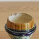 Late 19th-century earthenware egg cup in slipware