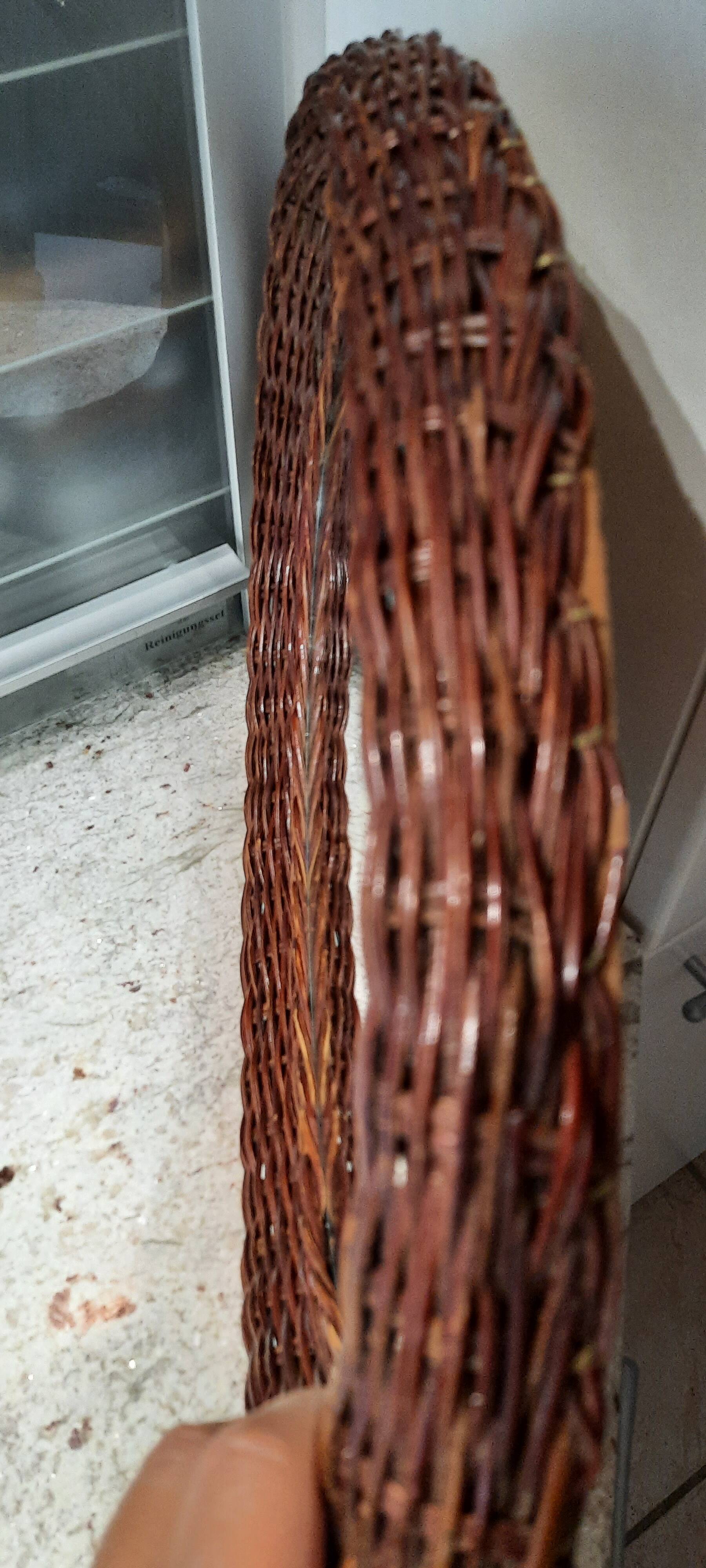 Vintage woven wicker oval mirror