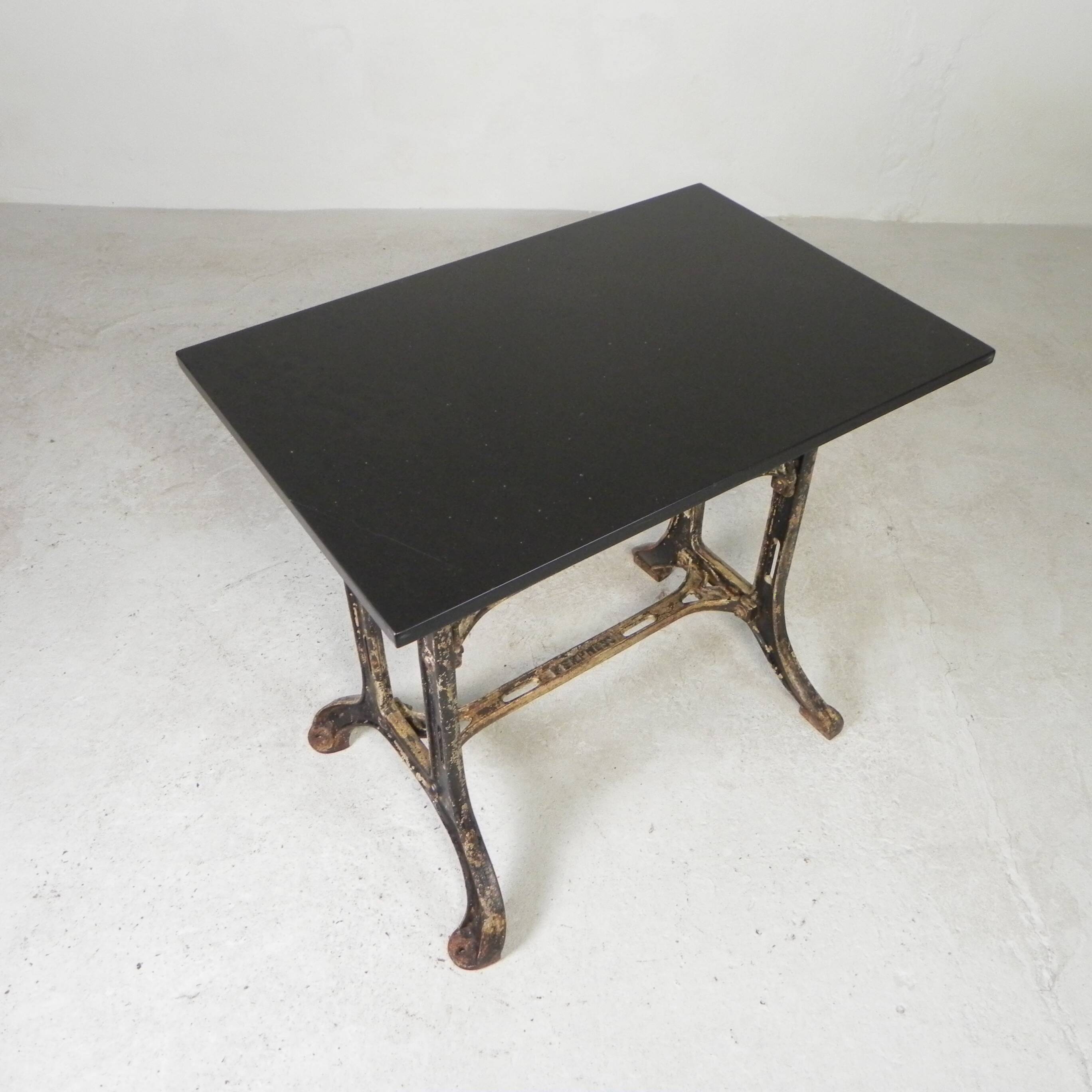 Industrial table, garden table with hard stone slab on cast iron frame, 1930s