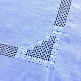 Rectangular tablecloth with embroidered openwork pattern