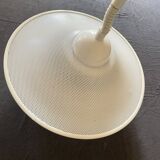 Suspension of the 80s in perforated white metal