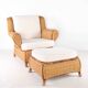 Large wicker armchair and its ottoman