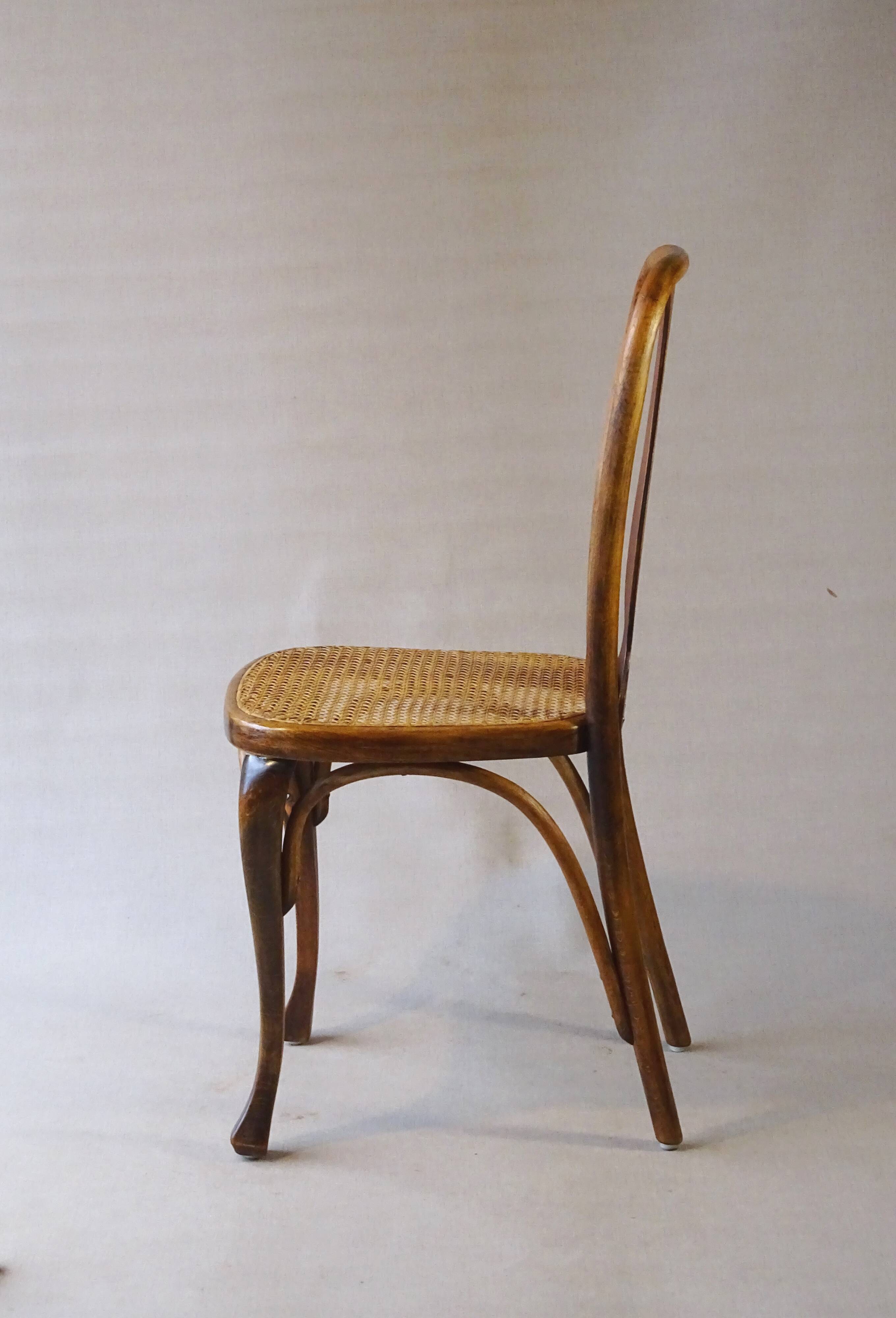 Two Kohn chairs, No. 529, circa 1910, bistro style, caned, bentwood