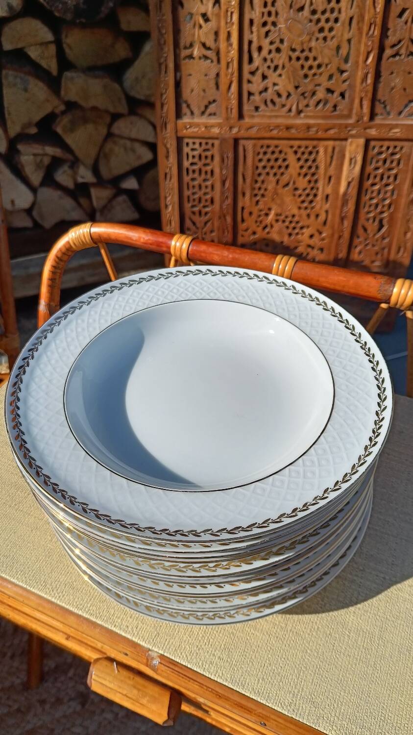 Twelve white porcelain plates