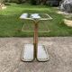 Italian side table in gilded brass and glass, Hollywood Regency style, 1970s.