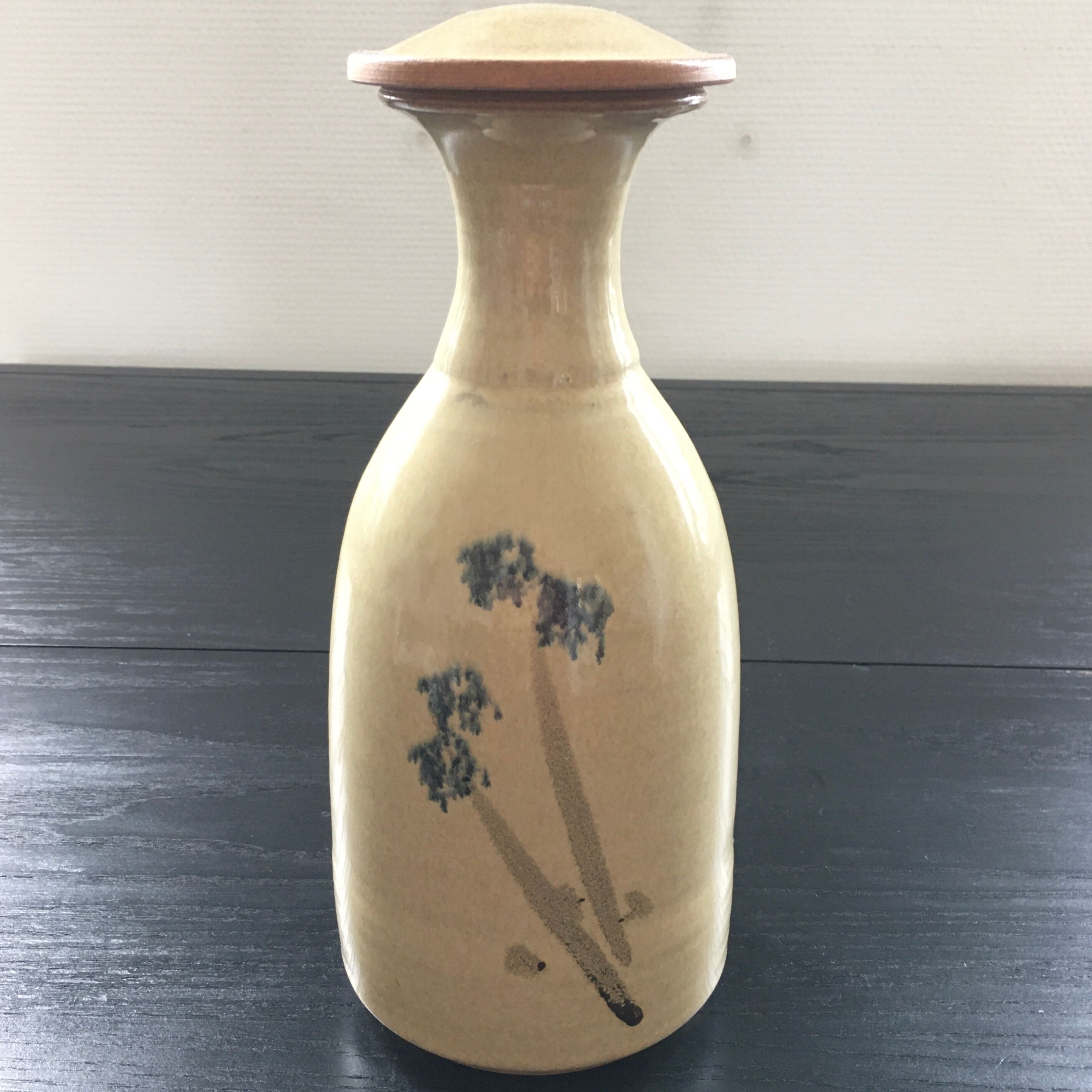 Stoneware carafe with floral decoration