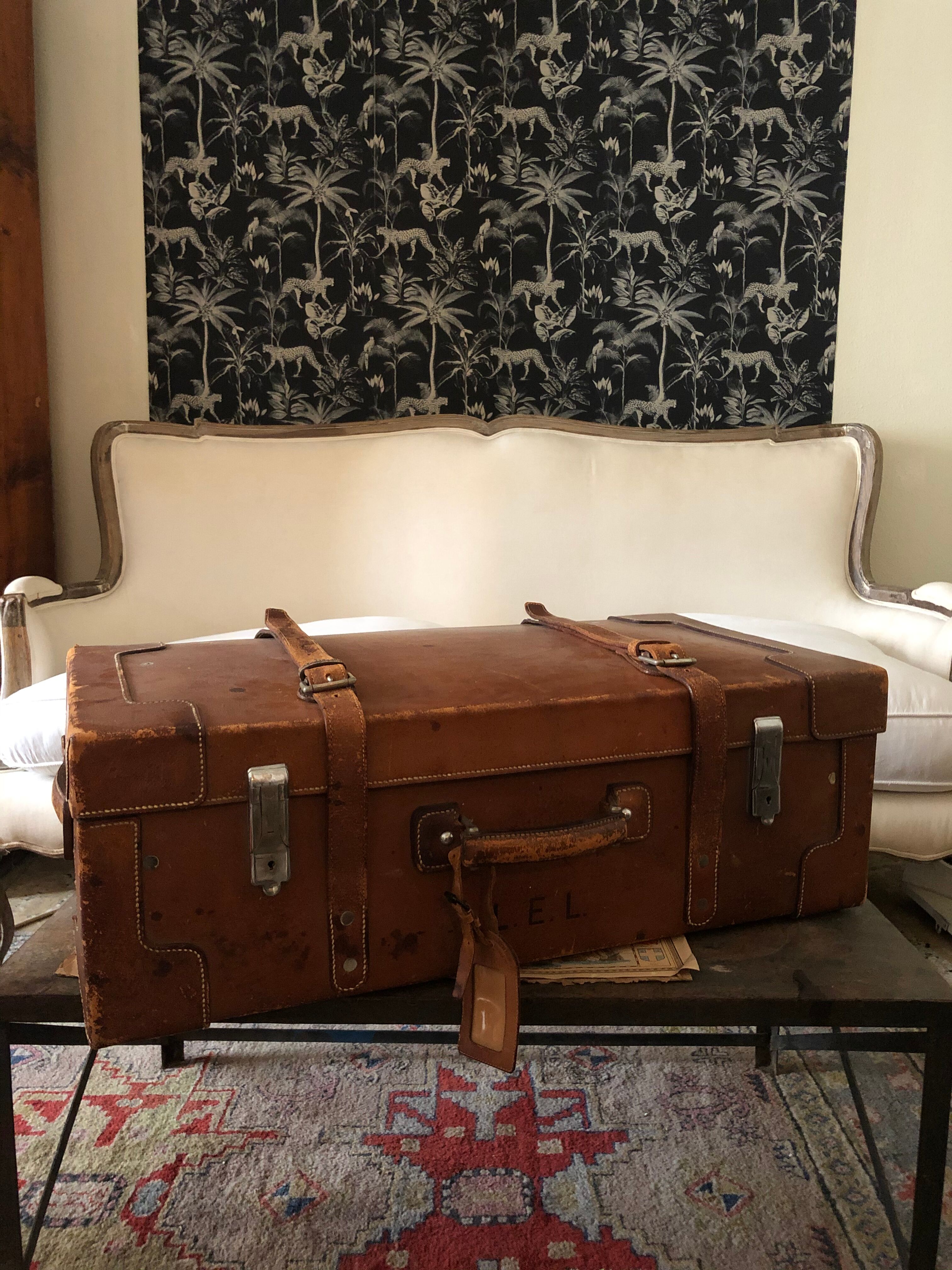 Former leather trunk with Louis Vuitton label holder