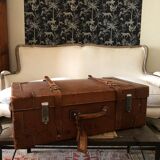 Former leather trunk with Louis Vuitton label holder