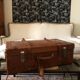Former leather trunk with Louis Vuitton label holder