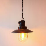 Old luminaire in enamel and bakelite