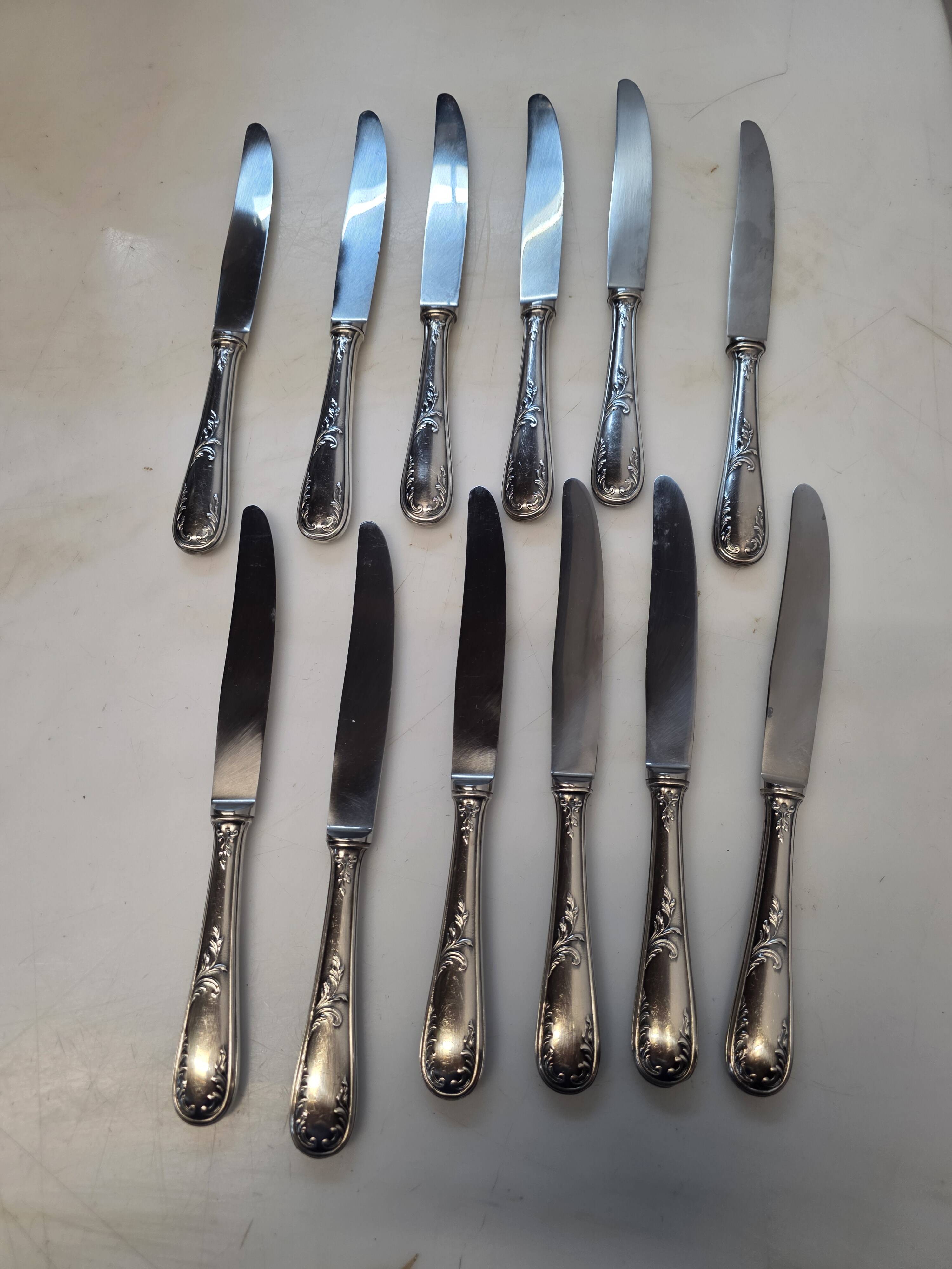 12 silver-plated knives