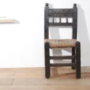17th-century farmhouse chair with carved motifs – wabi sabi