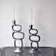Pair of circle candlesticks by matthew hilton, england, 1980