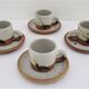 Four pottery cups and saucers from La Colombe Vallauris
