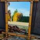 Turned wooden mirror, circa 1900
