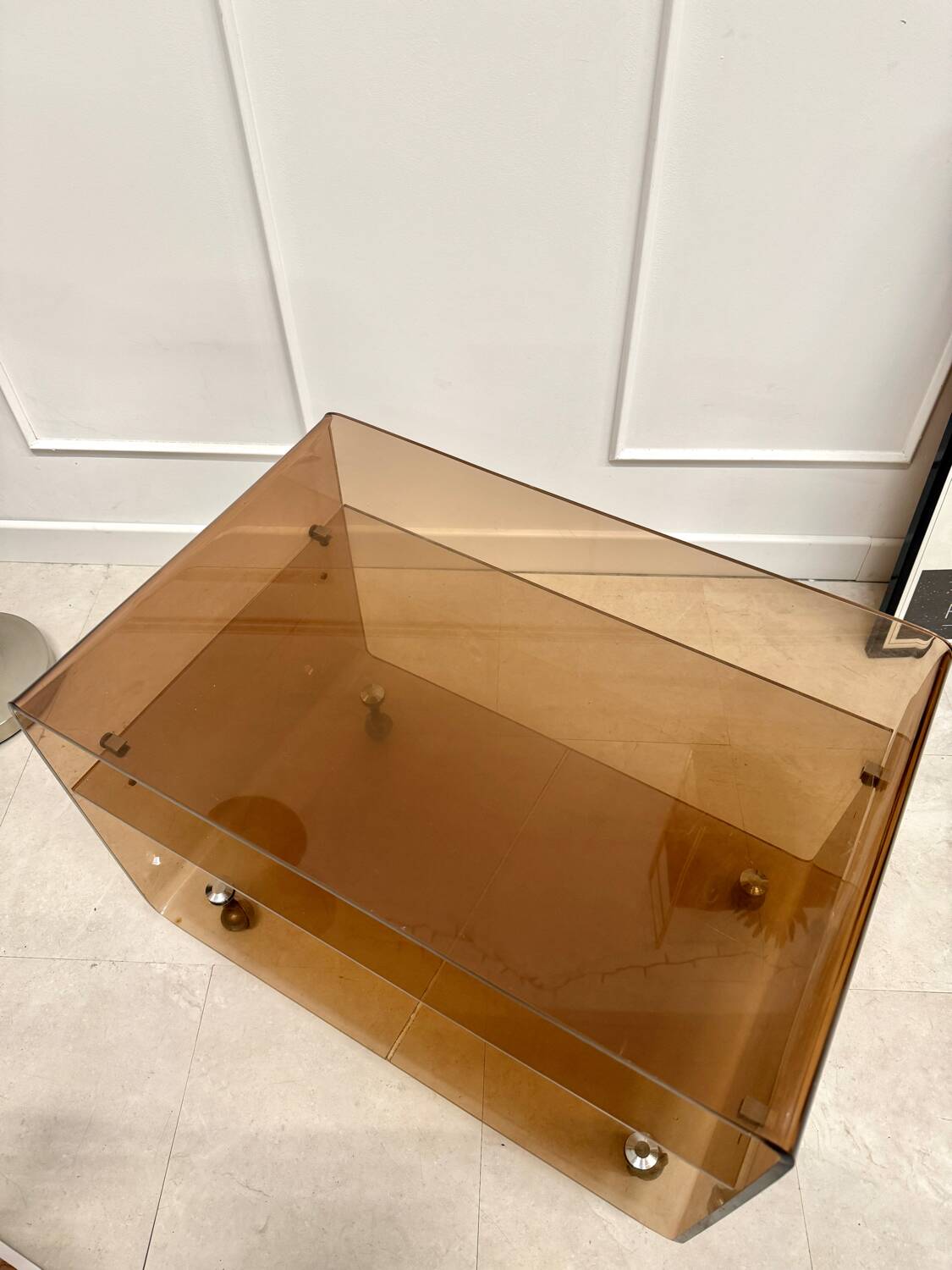 Smoked plexiglass coffee table