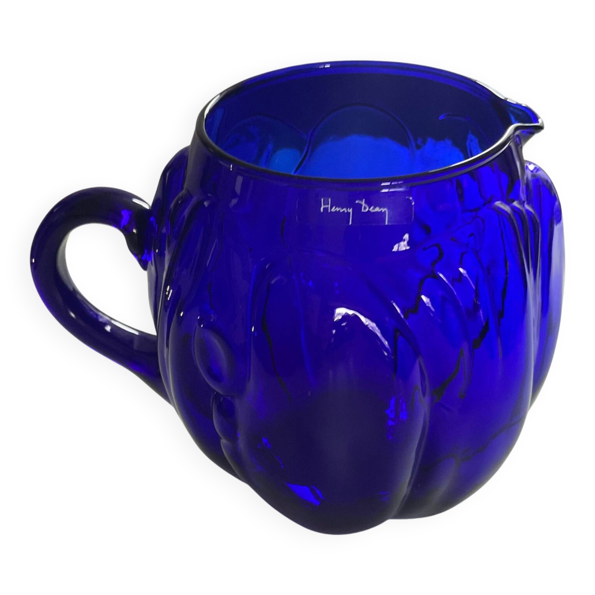 Vintage cobalt blue glass pitcher by Henry Dean