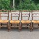 4 Louis XV chairs in solid carved oak with rush seats from the 19th century.
