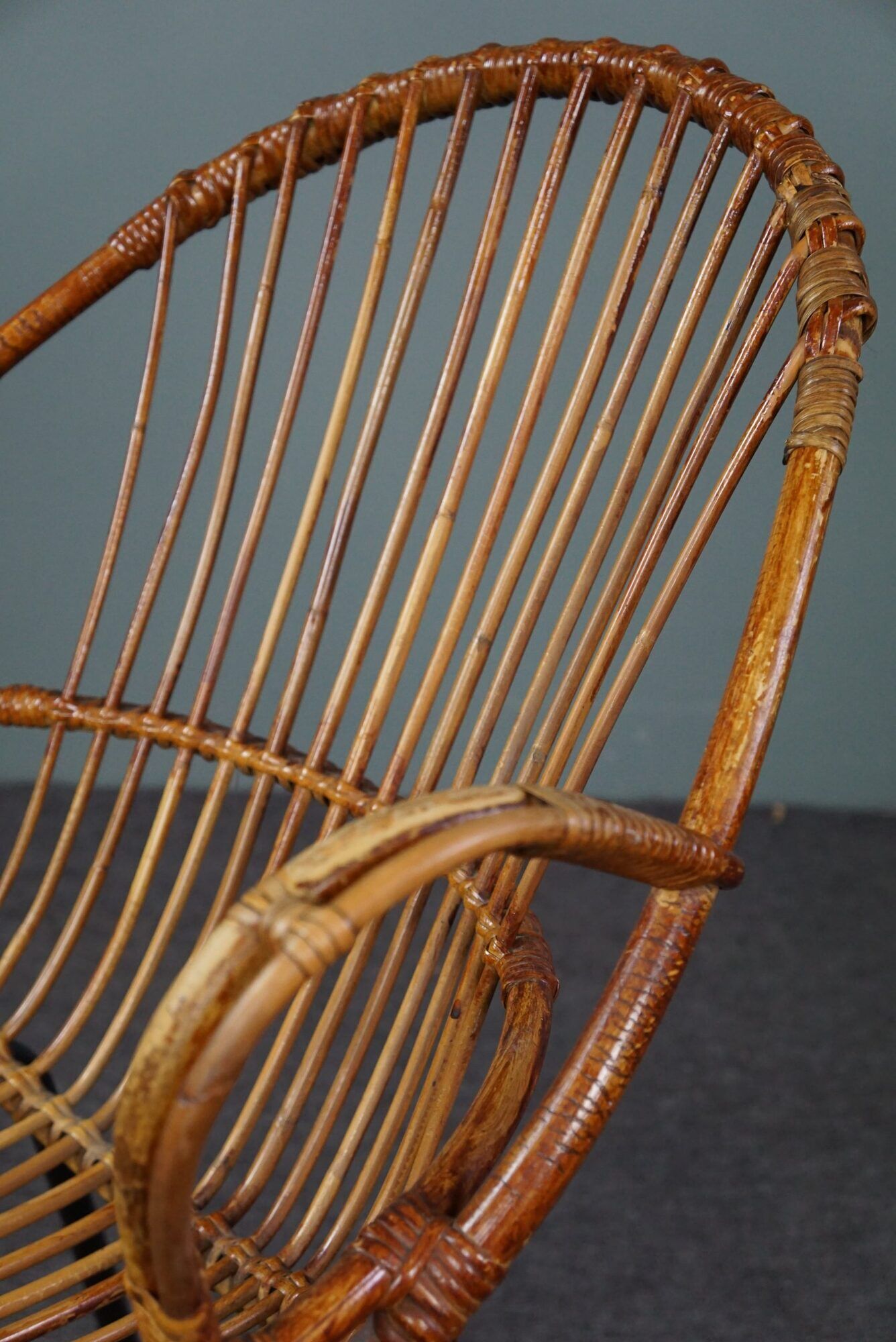 Dark rattan armchair with armrests Dutch Design 1960