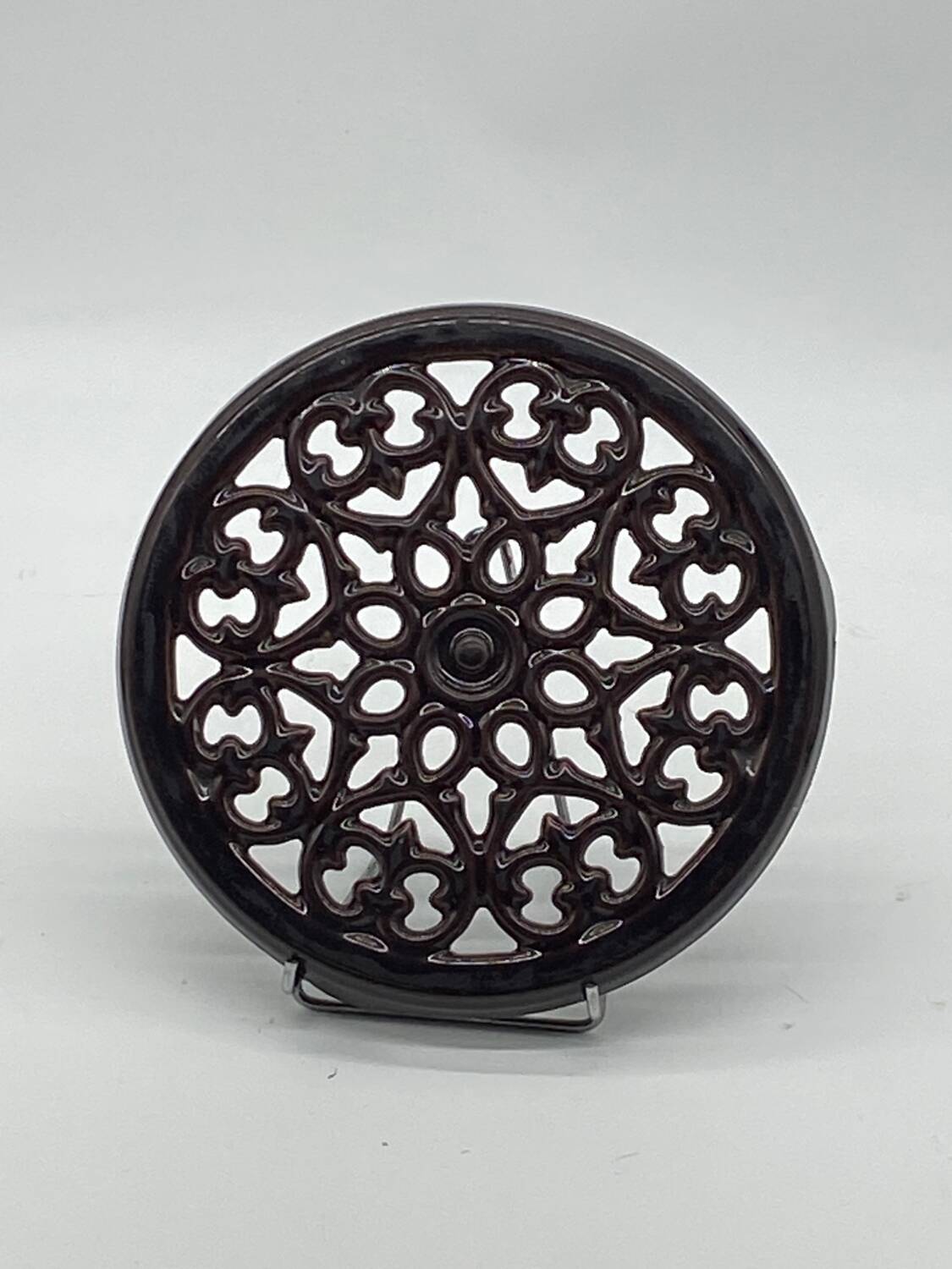 Brown enameled cast iron trivet vintage, old