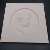 Portrait cast in low relief on plaster. SEDAP workshop.