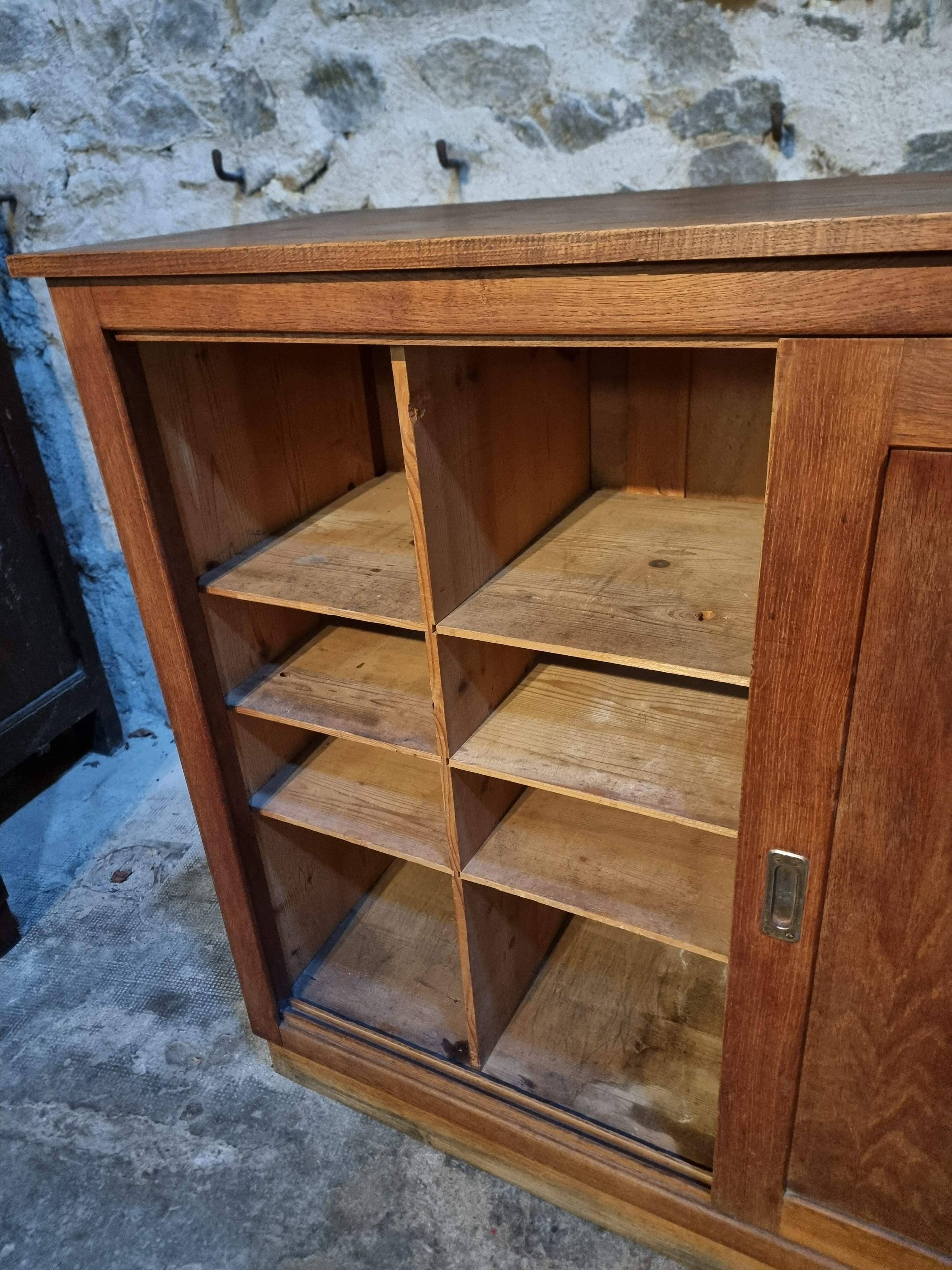Oak sliding door wardrobe, 1920s