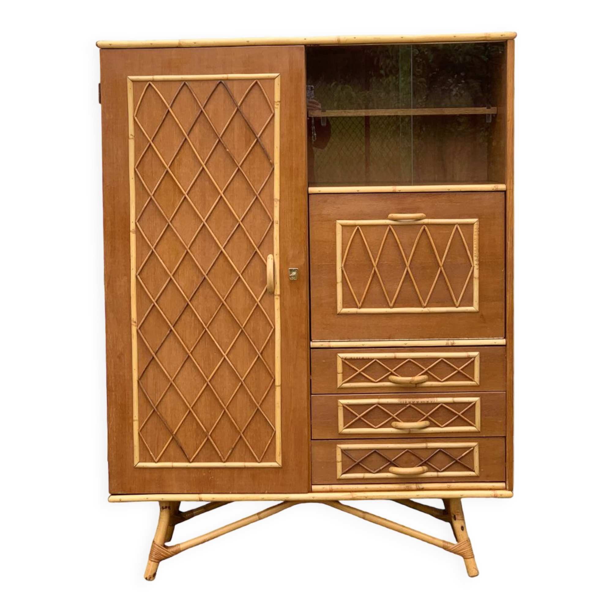 Rattan wardrobe with tapered legs from the 1960s.