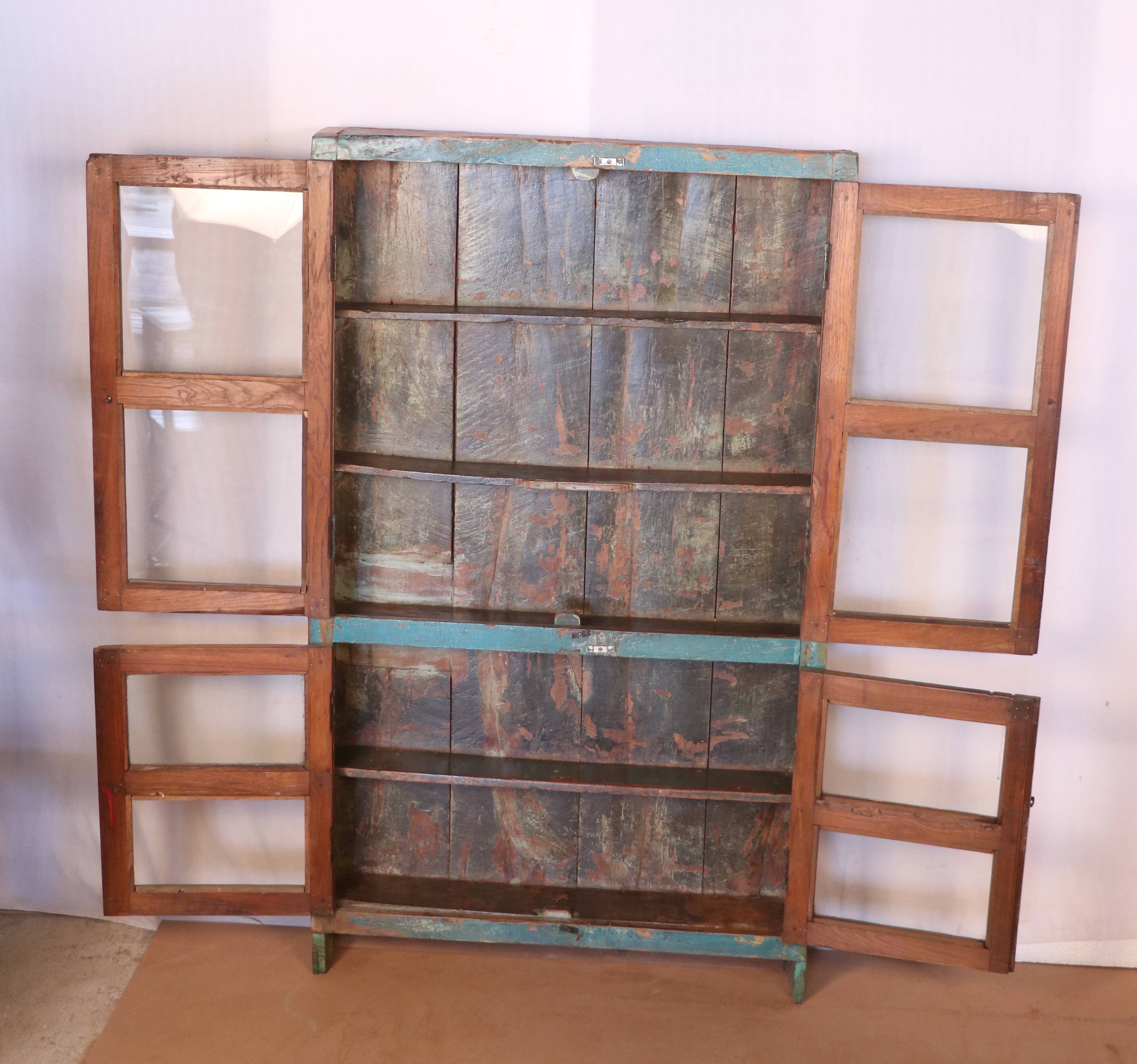 Old showcase in original blue patina Burmese teak