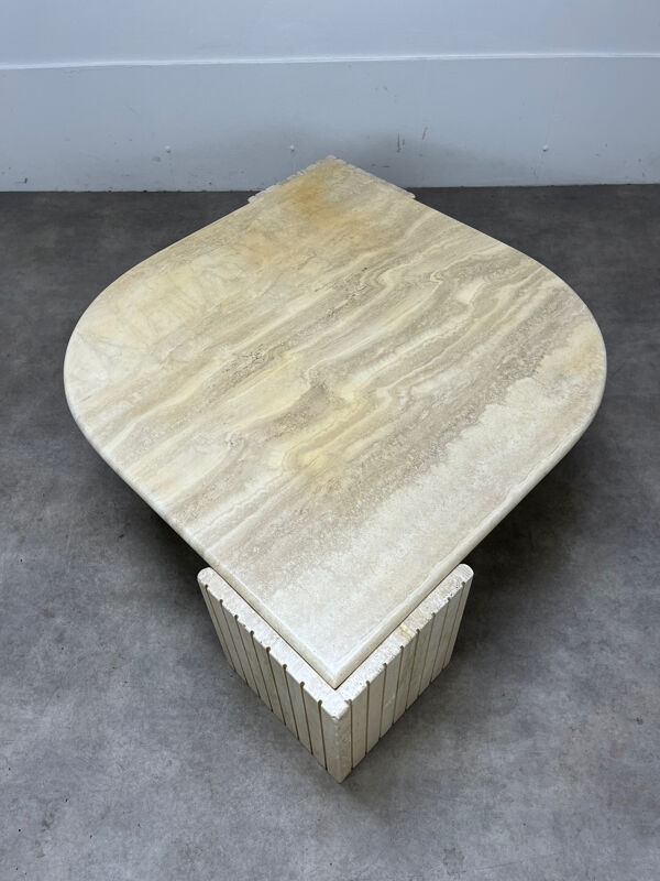 Table basse travertin forme œil par Roche Bobois