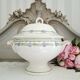 Antique deep plates in ironstone with a soup tureen.