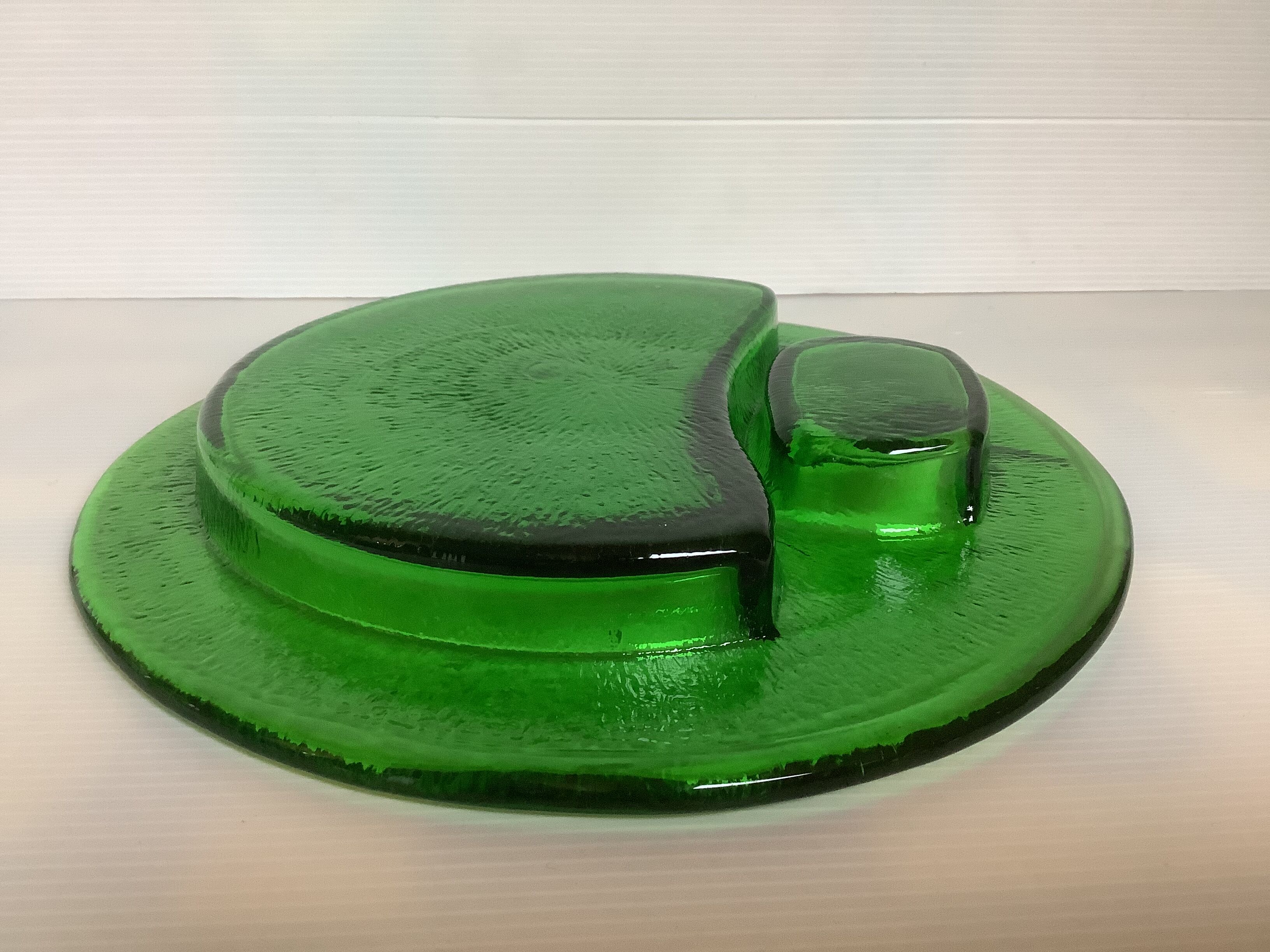 Handcrafted thick green glass empty pocket