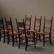 Set of 6 Arts & Crafts chairs, solid wood and straw, circa 1900.