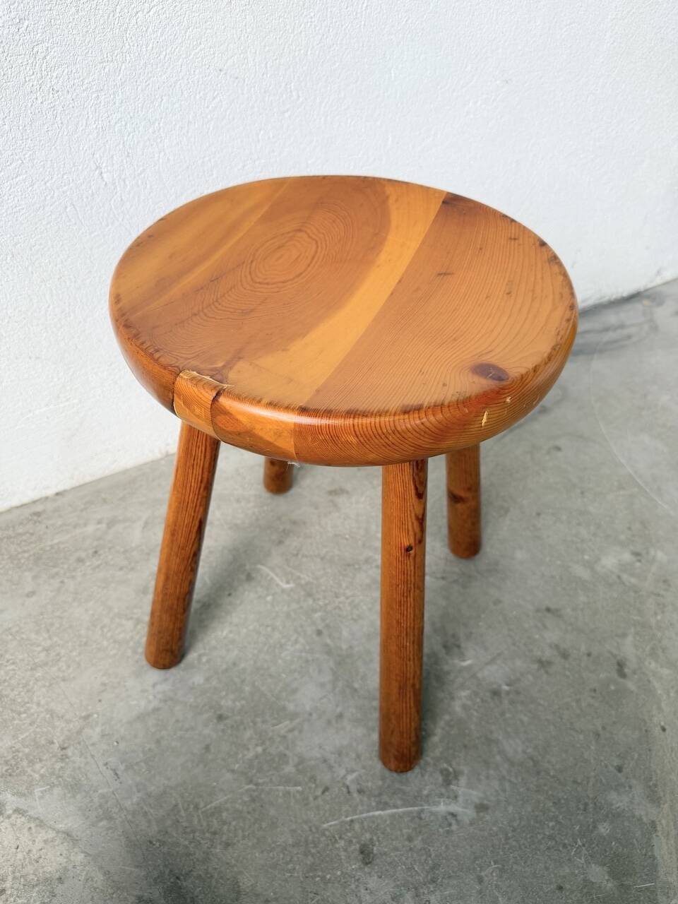 Pine stool assigned to Charlotte Perriand for Les Arcs.