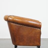 Sheep leather club chair with patina