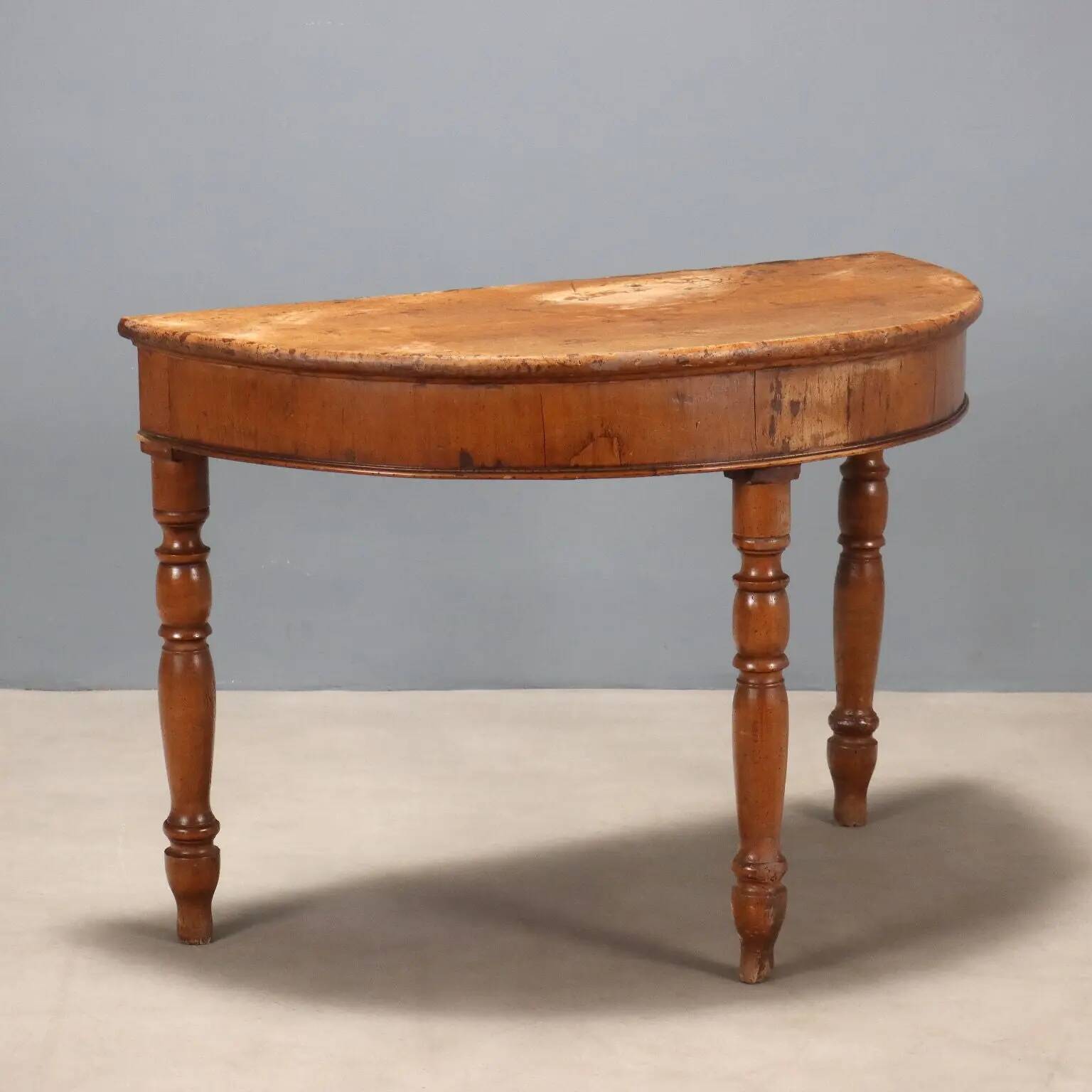 Antique walnut console with a half-moon top, Italy, 19th century.