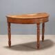 Antique walnut console with a half-moon top, Italy, 19th century.
