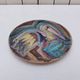 Ceramic plate with a bird, signed, vintage