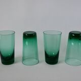 Set of a carafe and 4 designer glasses in green glass from the 70s