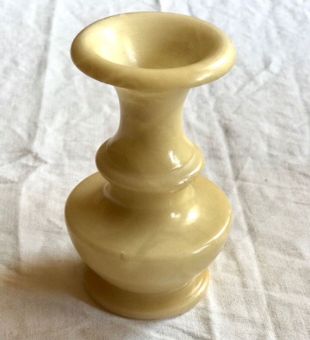 Cream-colored alabaster vase