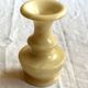 Cream-colored alabaster vase
