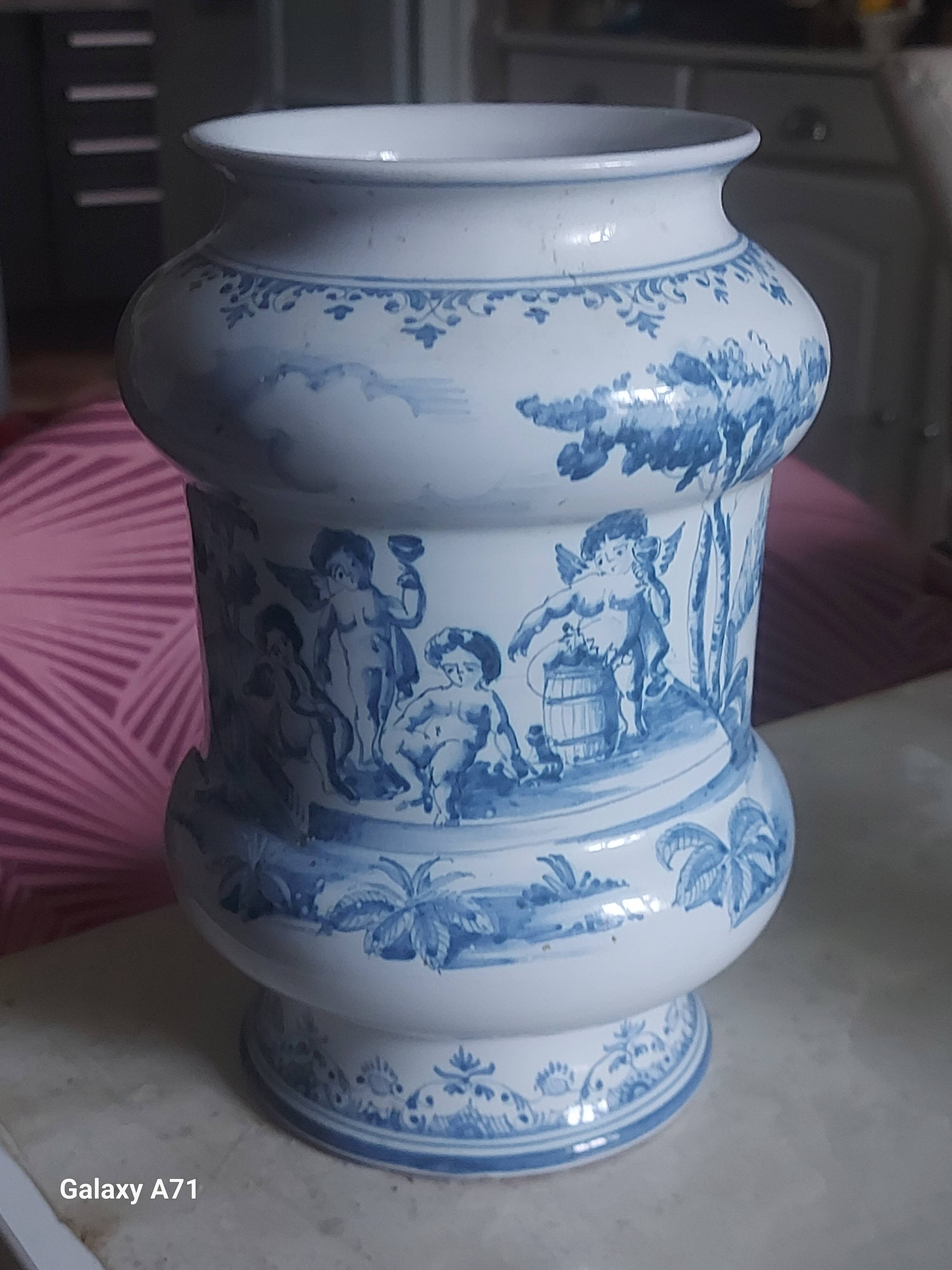 Moustier vase signed