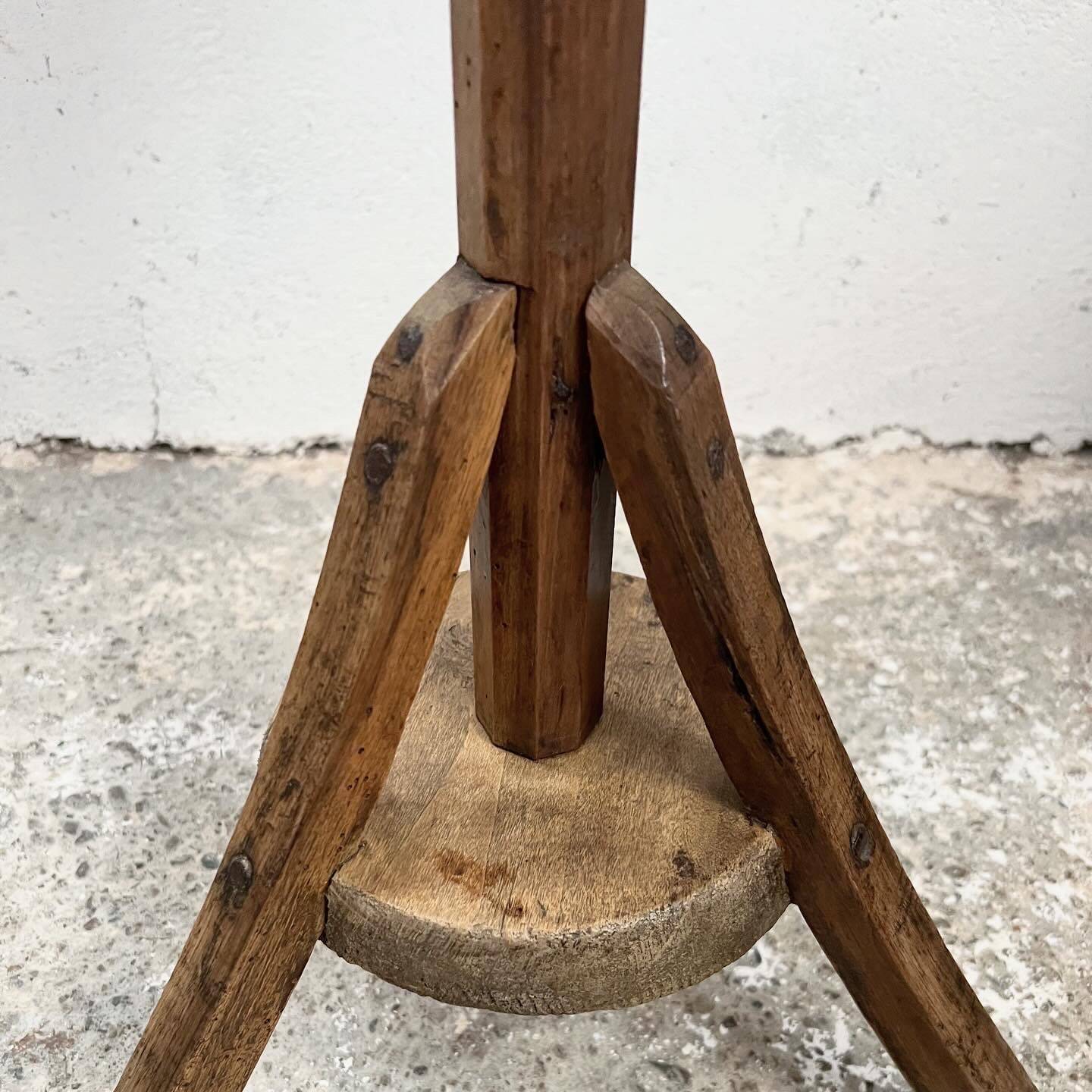 Old primitive wooden tripod pedestal table
