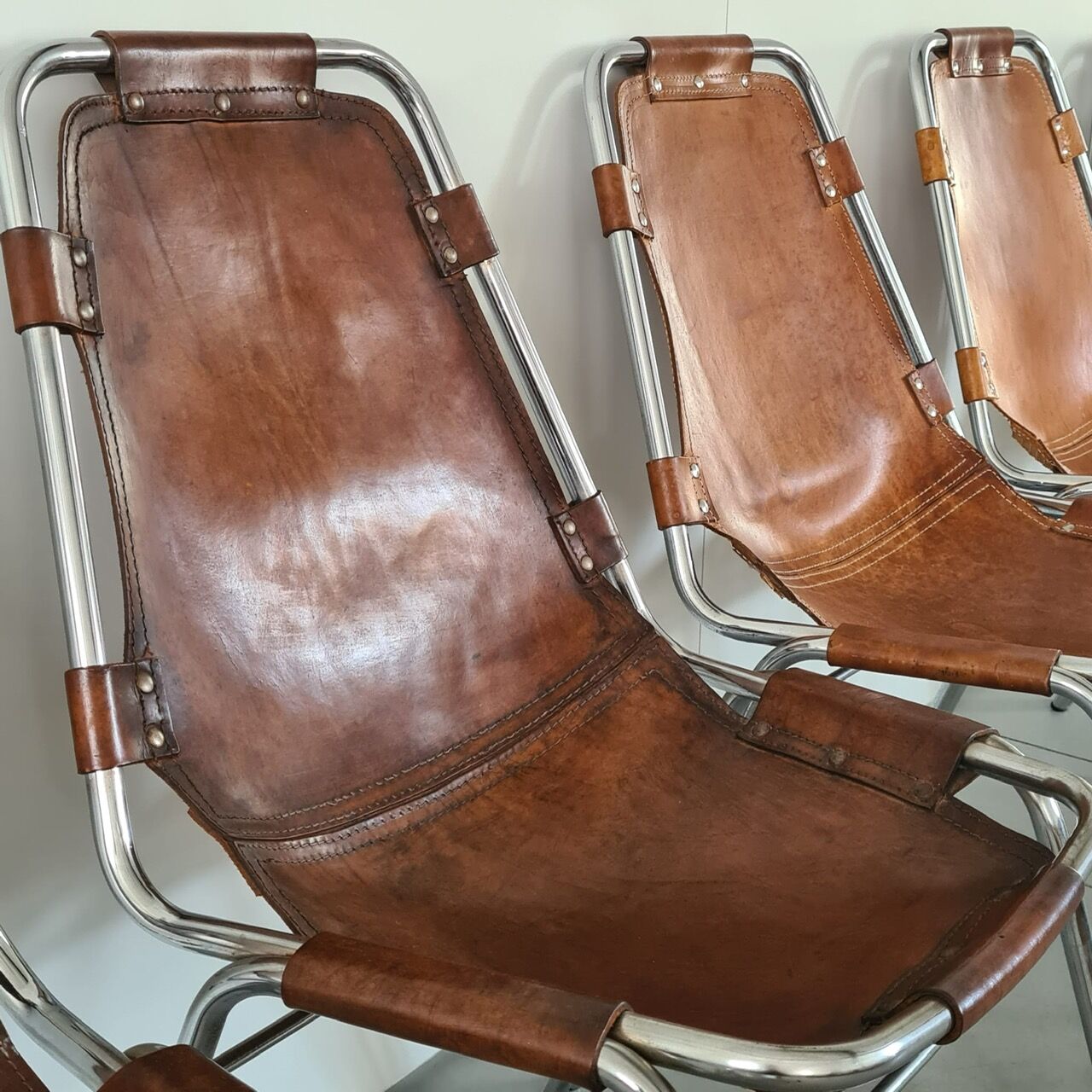 Set of eight mid-century leather dining chairs
