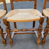 4 or 5 solid wood chairs with light oak straw and high backs