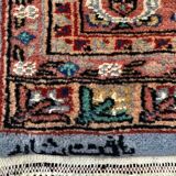 Tapis pakistanais en laine, signé et certifié
